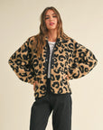 A black and brown leopard print sherpa print jacket. 