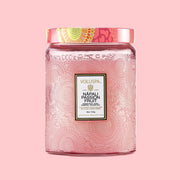 A large pink decorative jar with a white rectangular label that reads, "Napali Passion Fruit". 