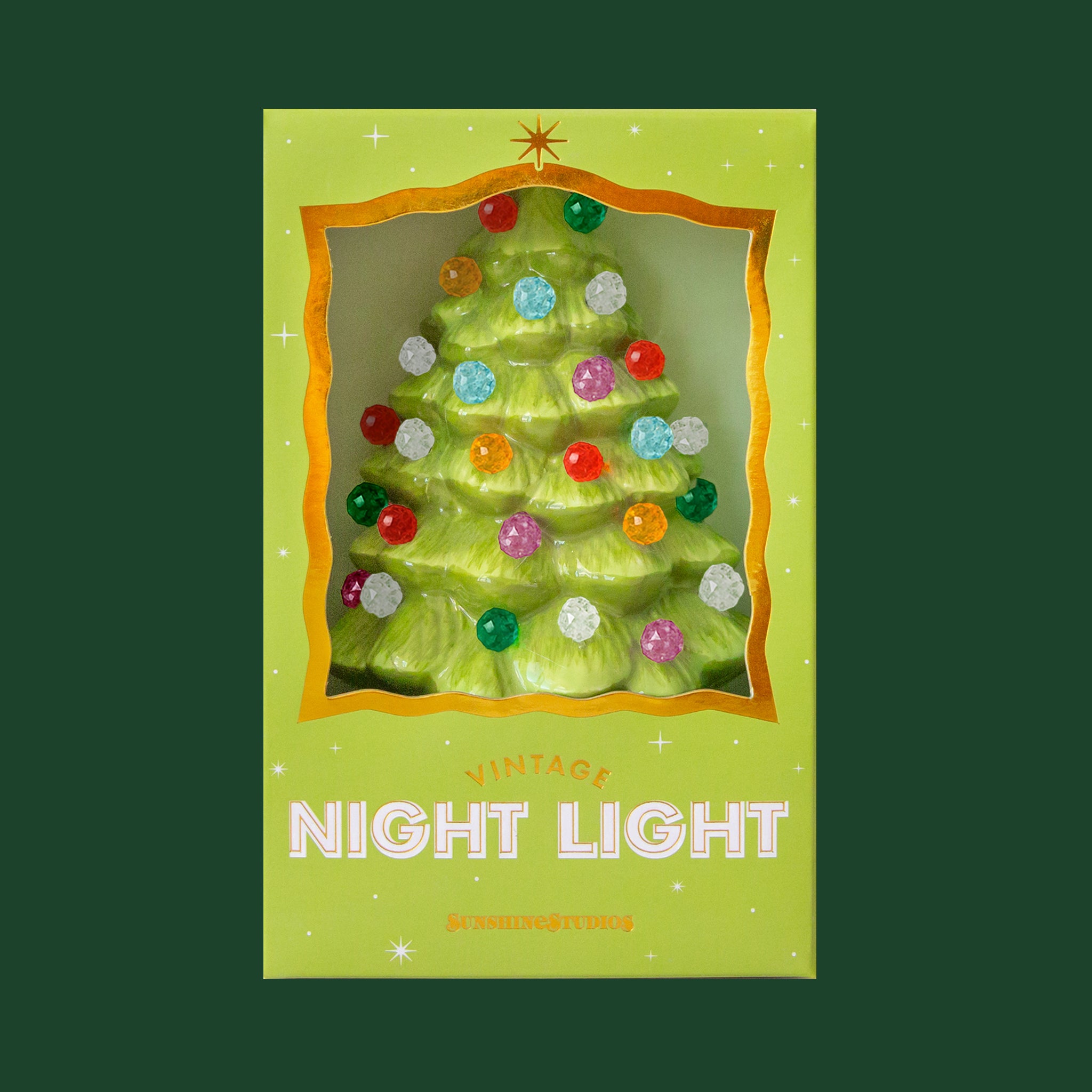 A green tree multi colored night light with sphere shaped lights. 