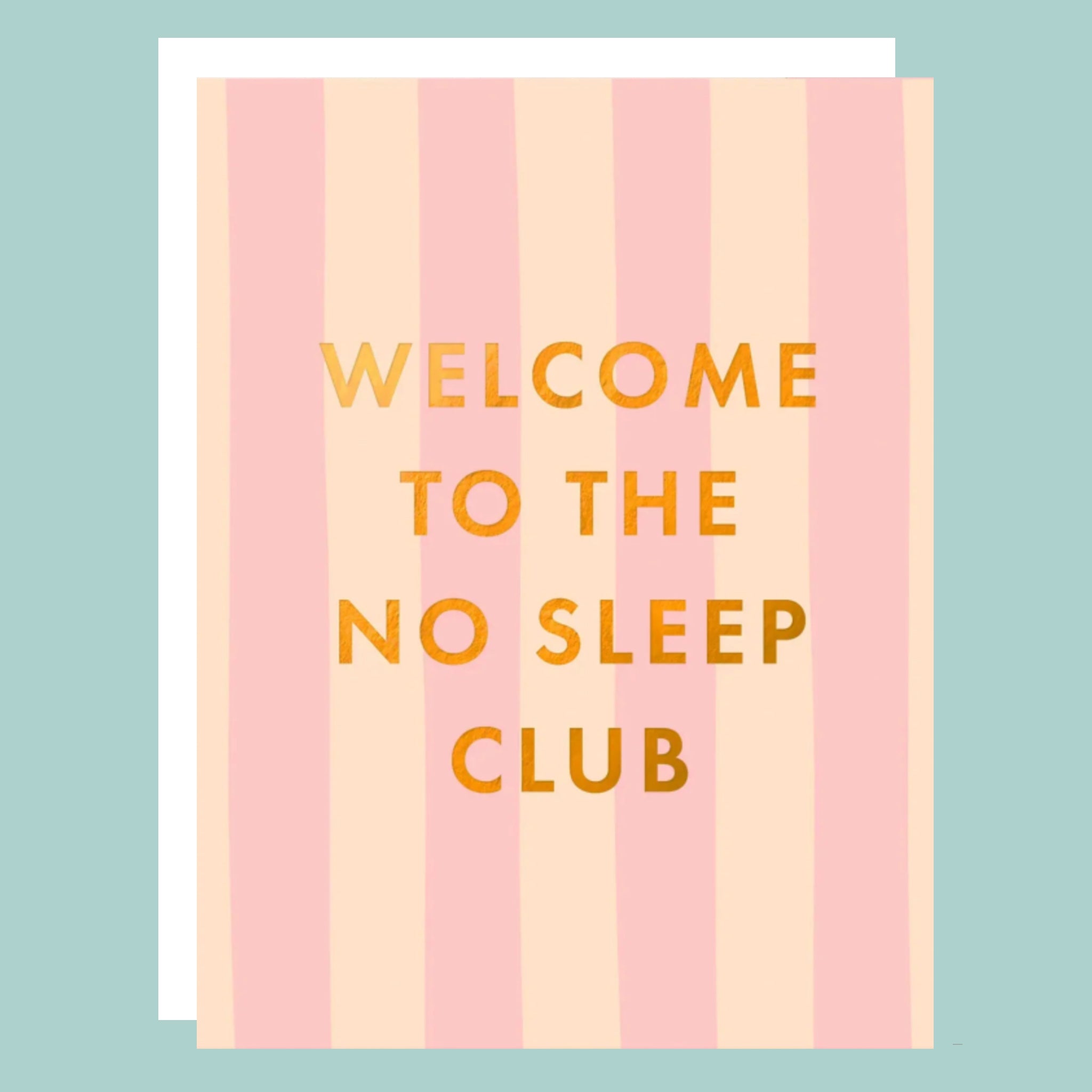 On a pink background is a pink and ivory striped card that reads, &quot;Welcome To The No Sleep Club&quot;. 
