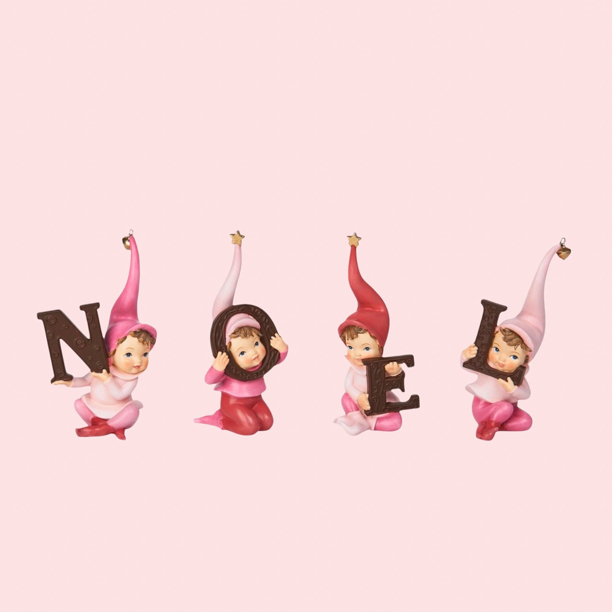 Christmas decorative elves holding the letters to spell "NOEL". Resin elves have cute pink hats that have bells and stars on them.