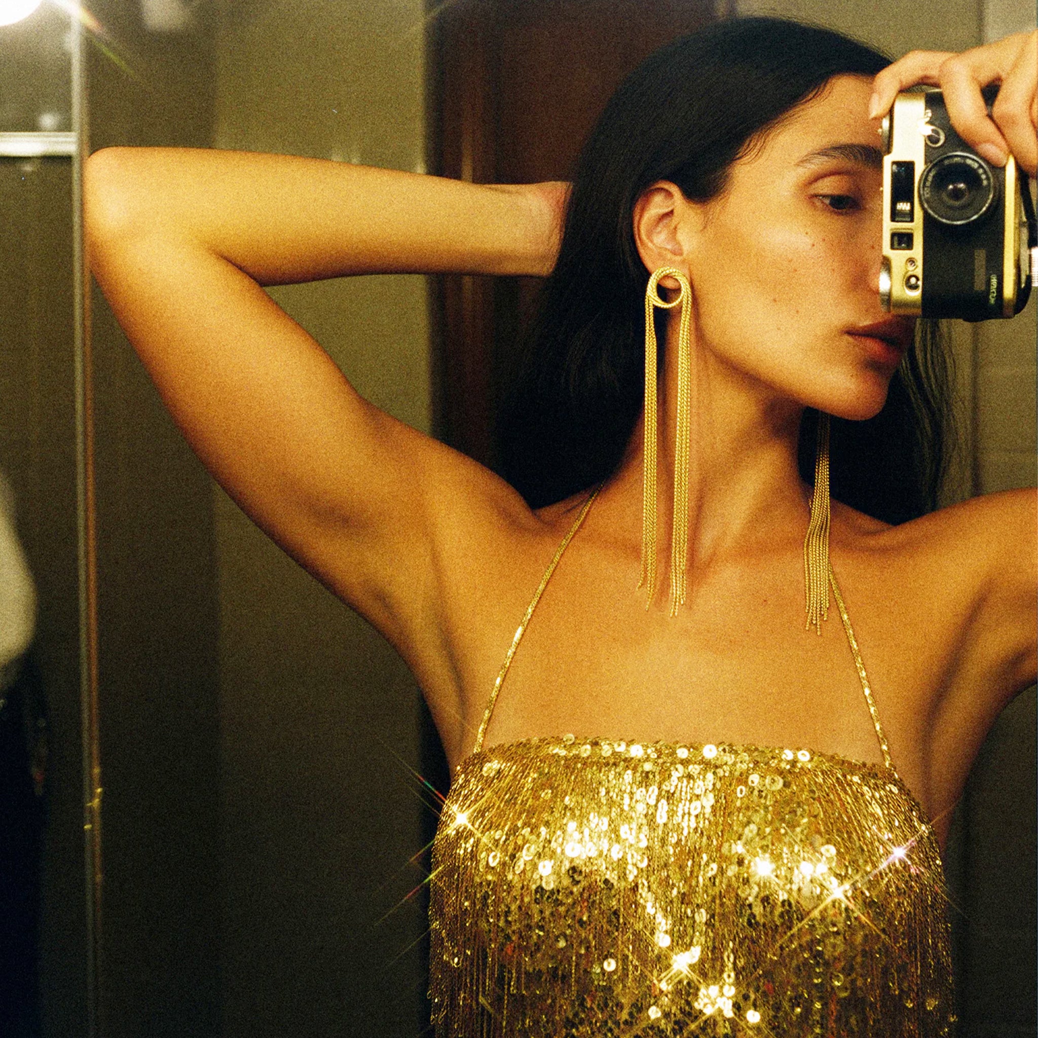 A pair of chain dangle earrings. 