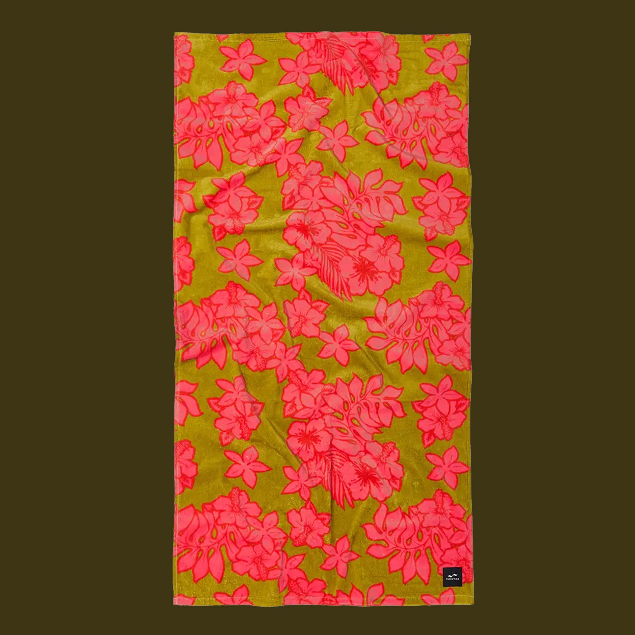 Floral towel with pink flowers on a green background