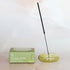 A green bubble shaped incense holder. Incense not included.  