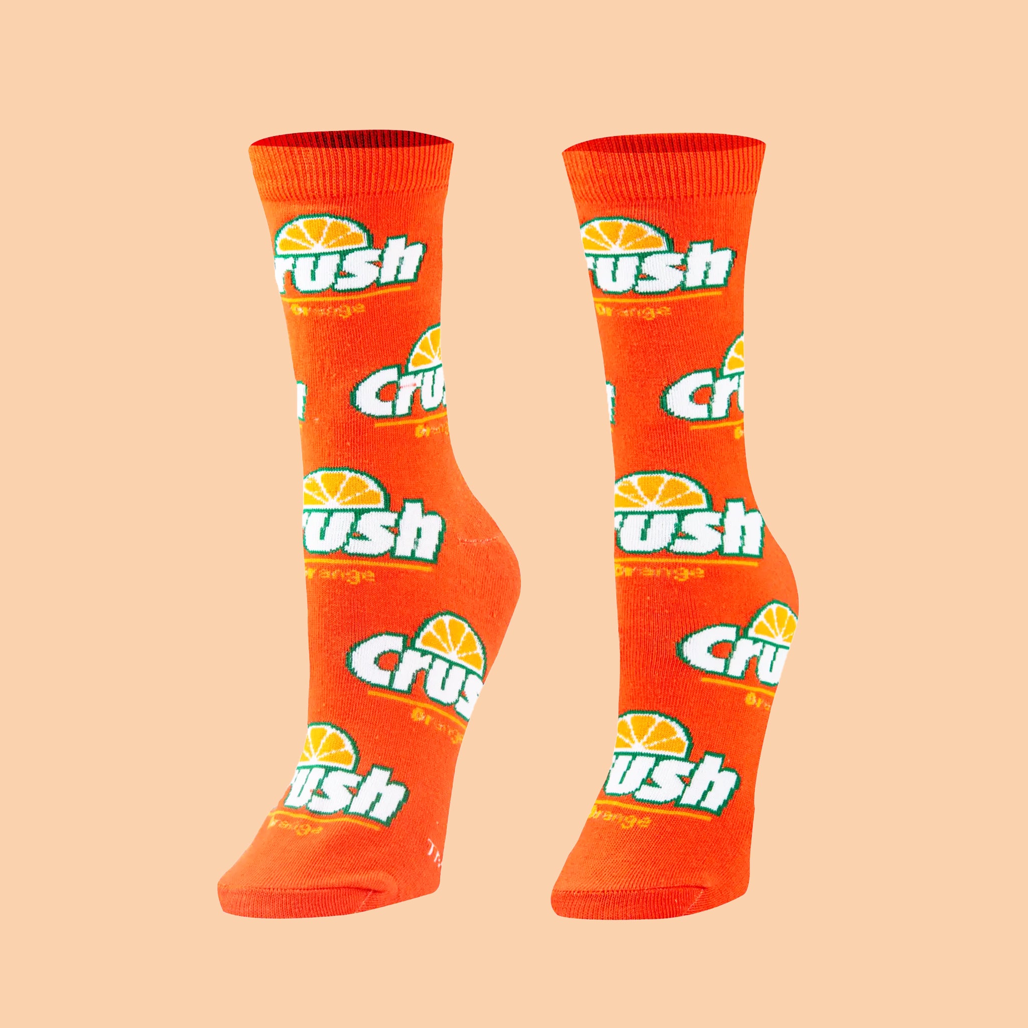 A pair of bright orange socks with the orange crush logo. 