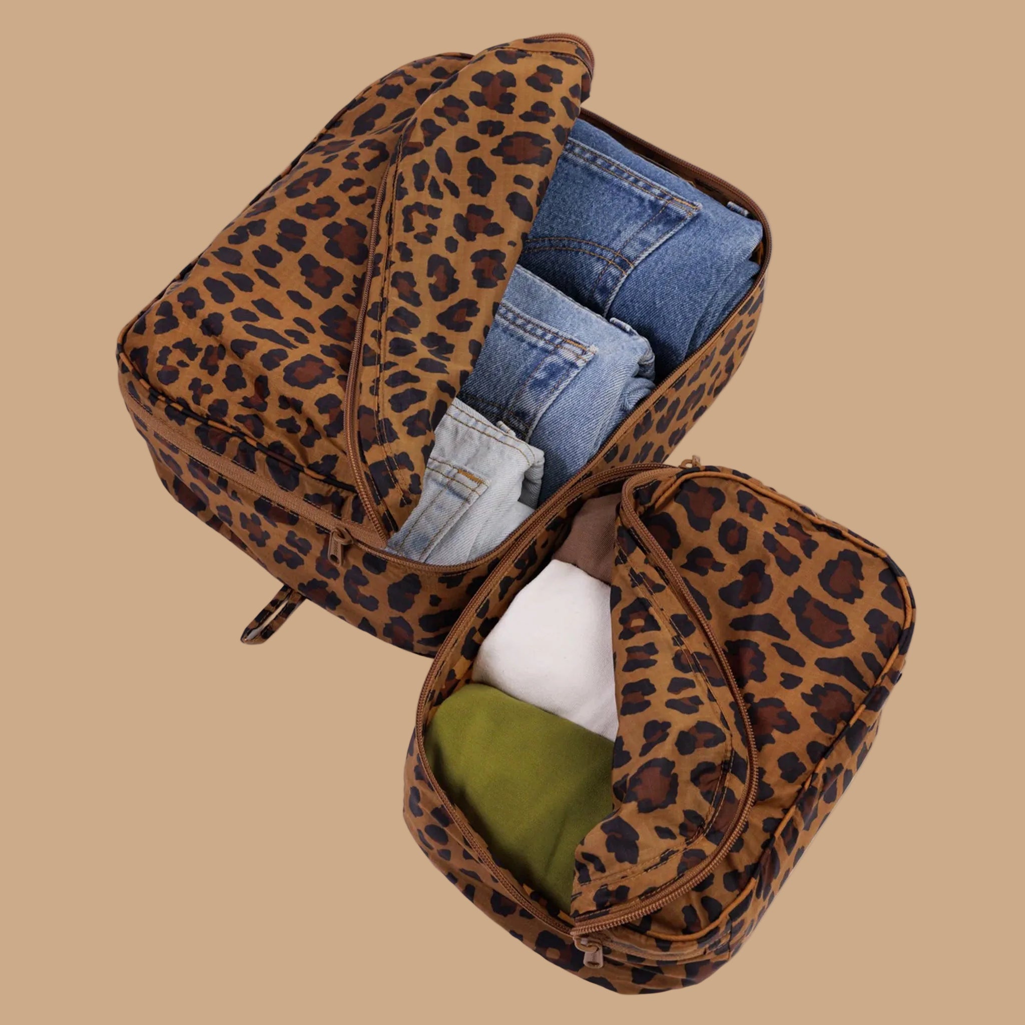 A brown and black leopard print packing cube set. 