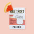 A pink and white packet of cocktail mix that reads, "Noble Mick's Single Serve Cocktails" along with an illustration of a paloma with its signature grapefruit garnish.