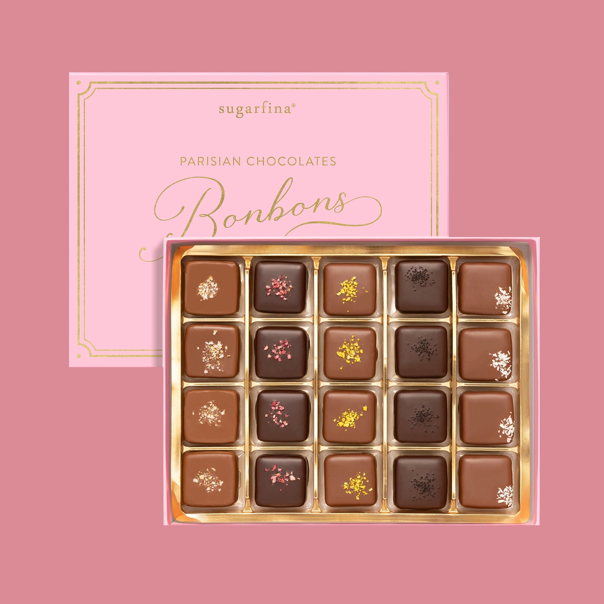 A box of assorted bon bons with text on the box that reads, 'Parisian Chocolates Bonbons". 