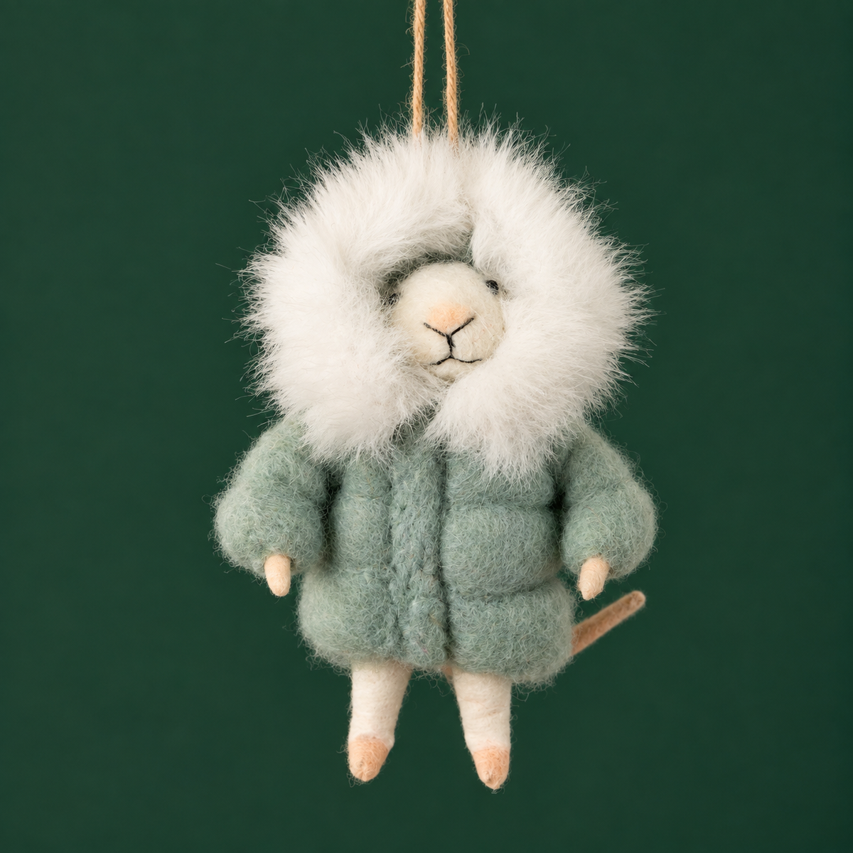 A mouse shaped ornament with a puffy jacket.