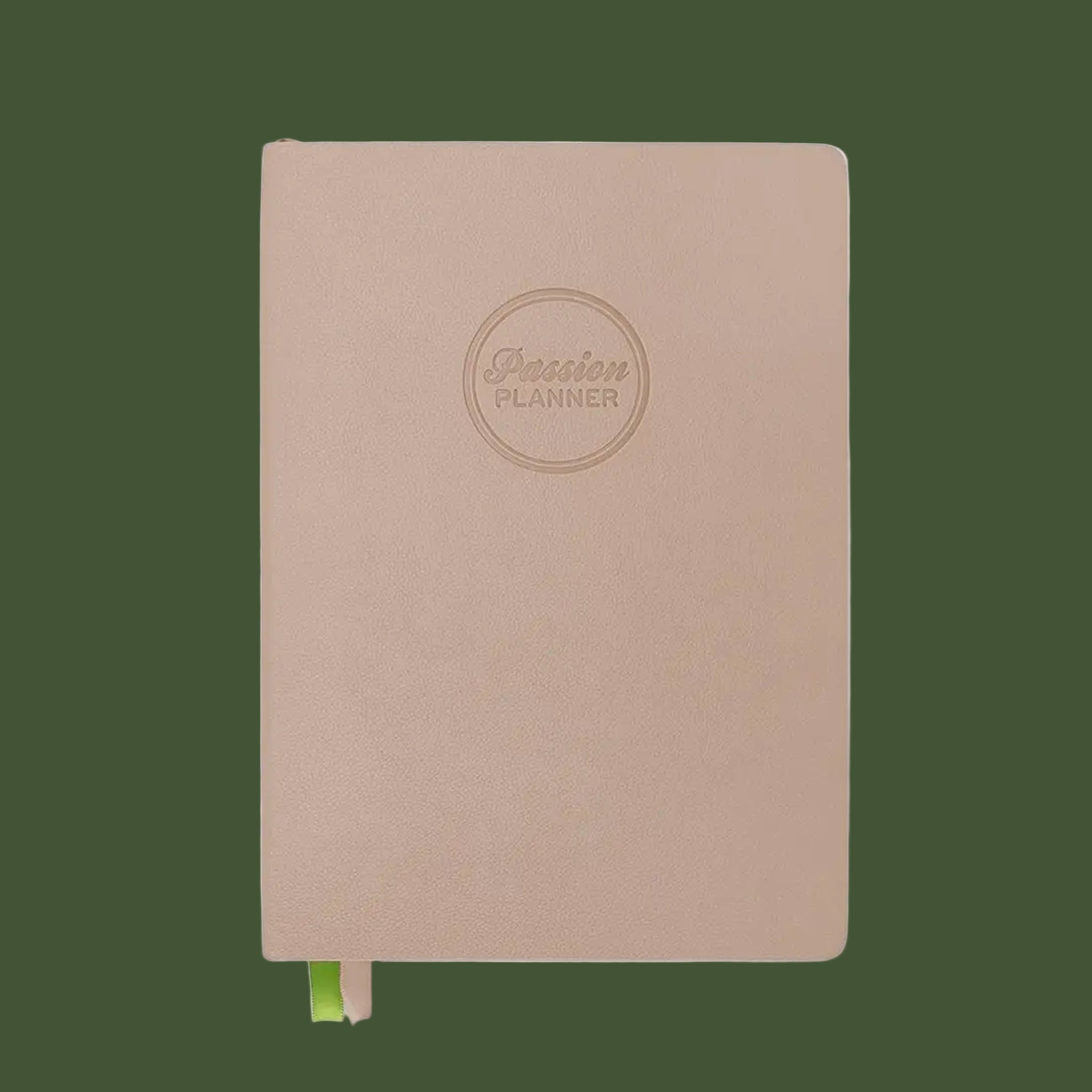 A tan planner with a circle logo in the center that reads, "Passion Planner".