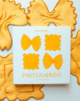 A set of four pasta shaped cloth cocktail napkins. 
