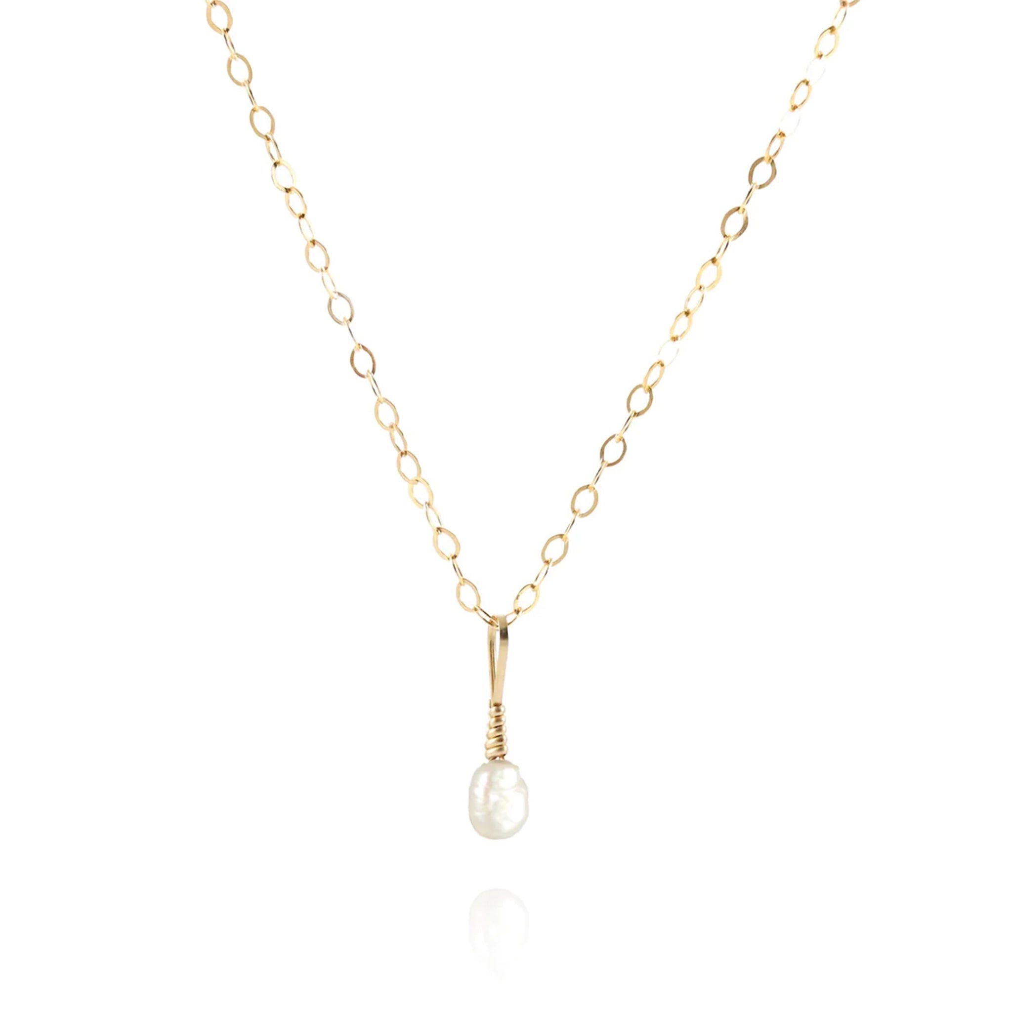 A gold filled necklace with a freshwater pearl pendant.