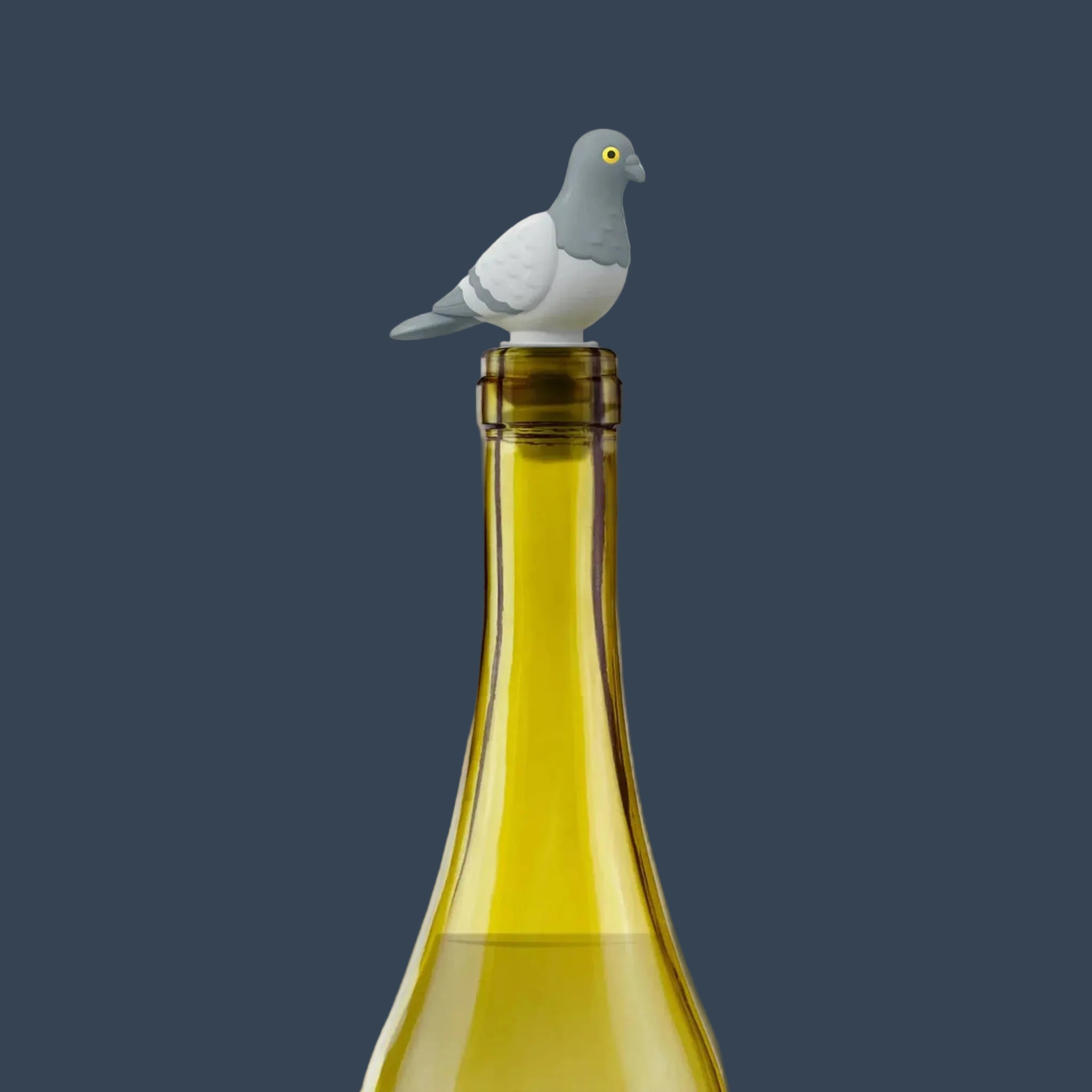 A grey pigeon shaped bottle stopper. 