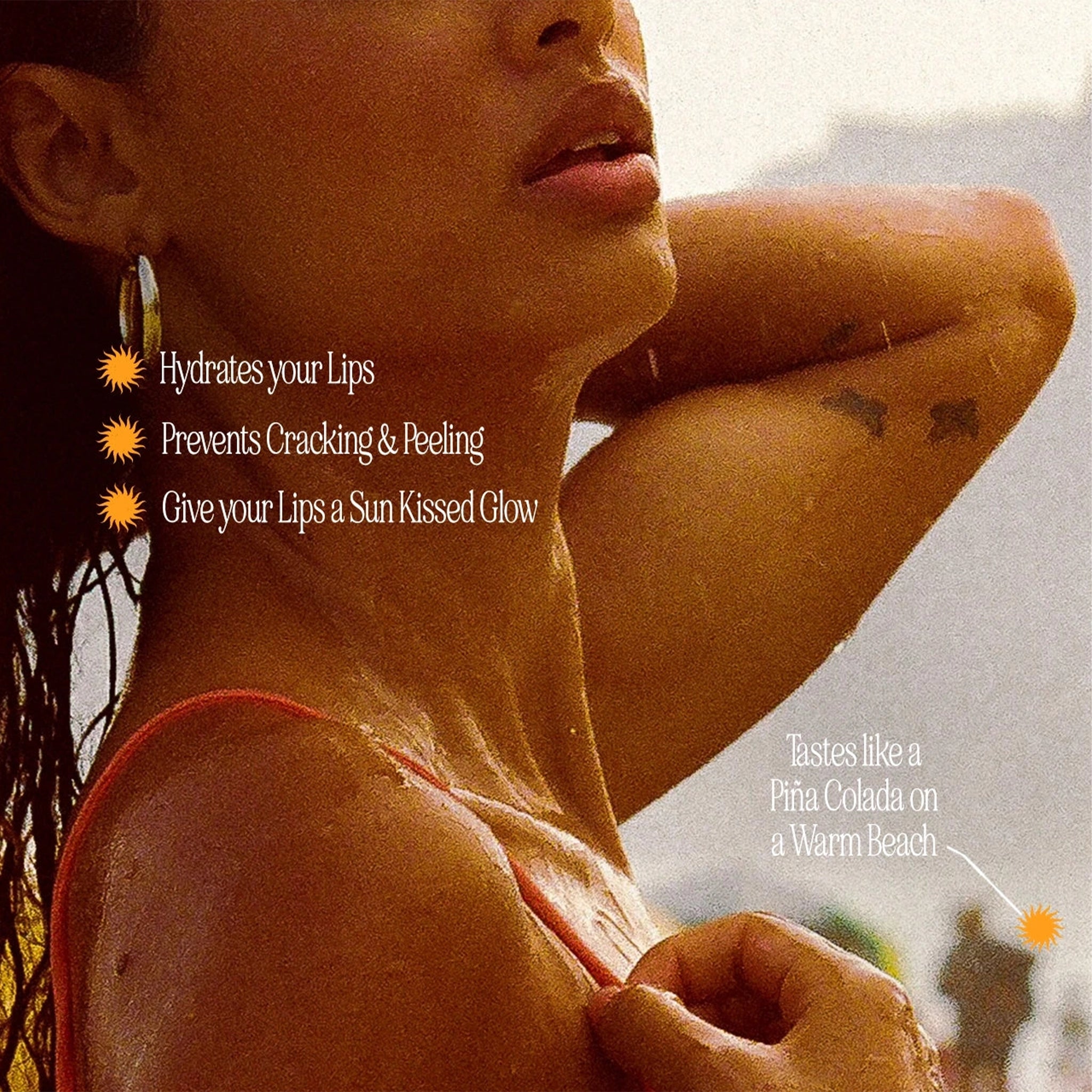 Woman with sun-kissed skin and tattoos, with text about lip care products.