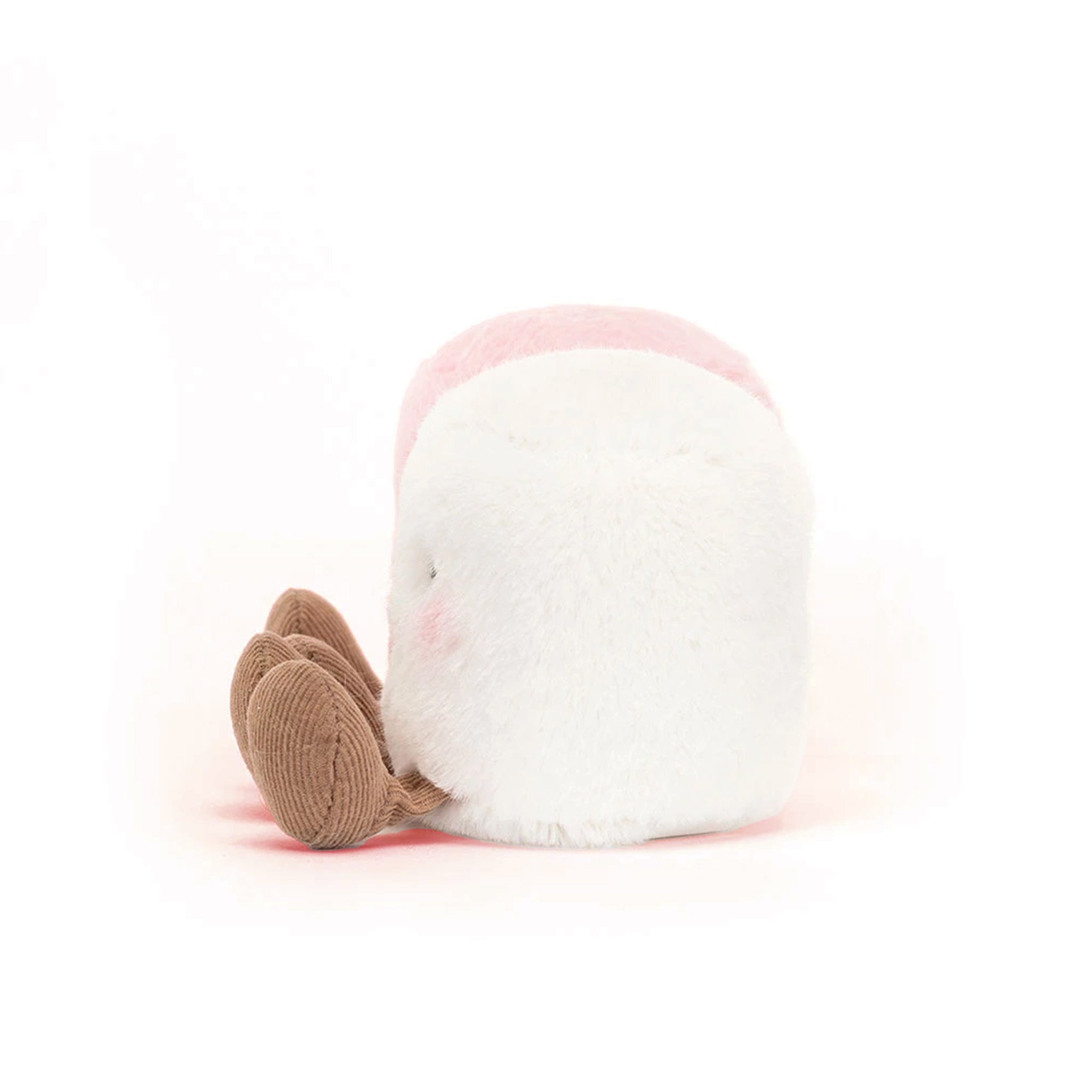 Two plush toys, one pink and one white, with smiling faces on a white background