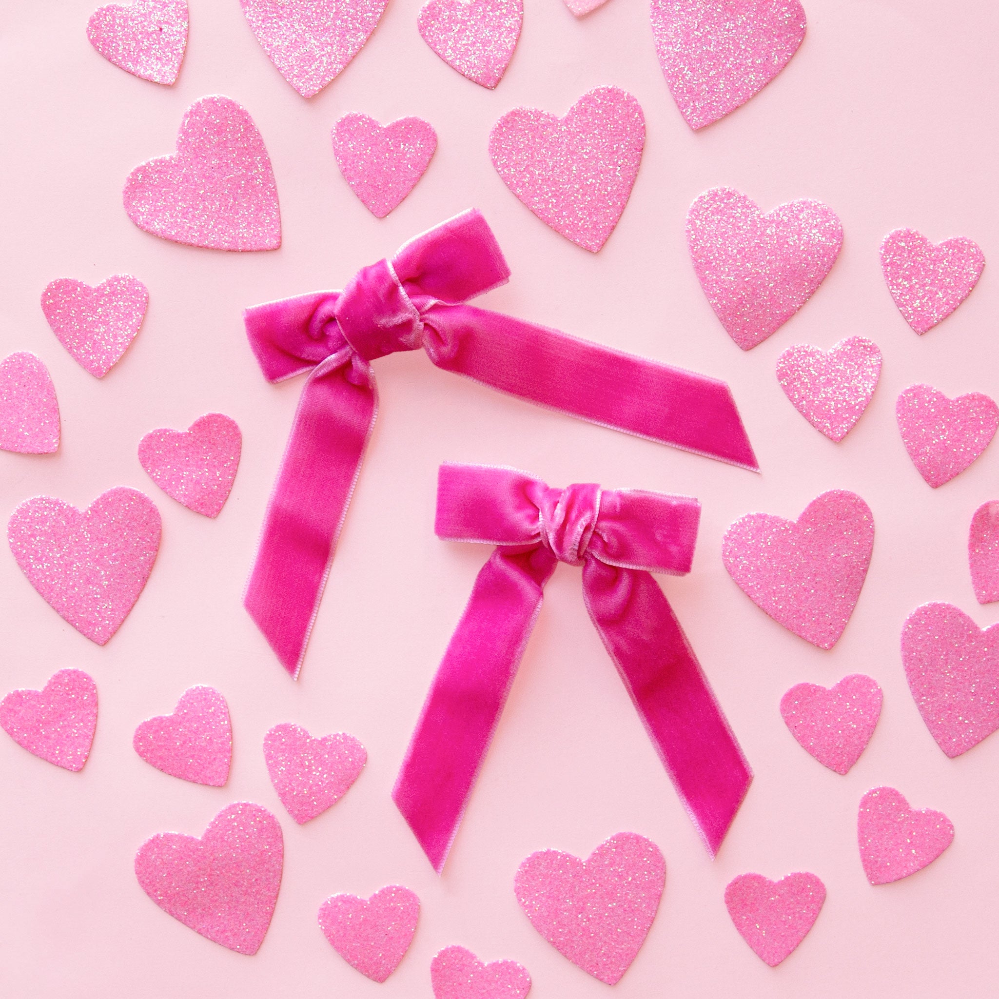 A pink set of hair bows. 