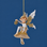a pixie shaped ornament on a mushroom