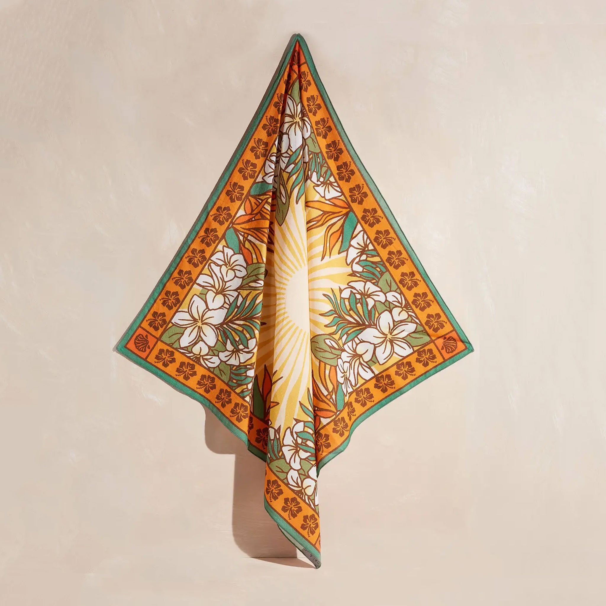 A tropical orange and teal bandana. 