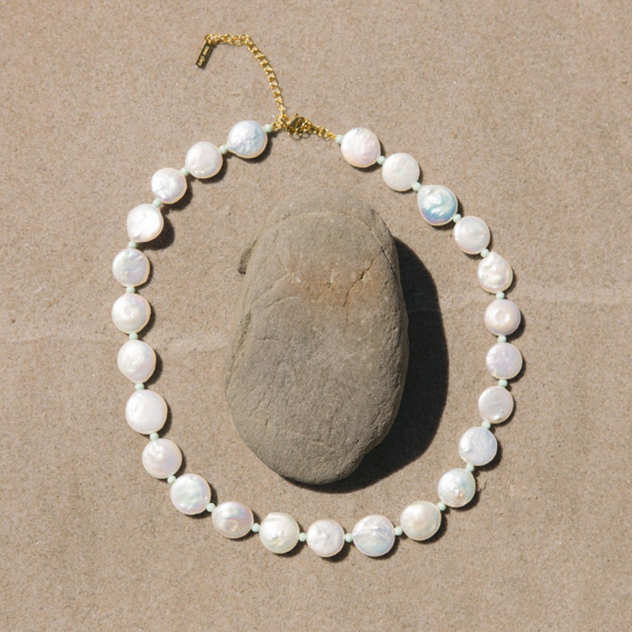 A large beaded pearl necklace. 