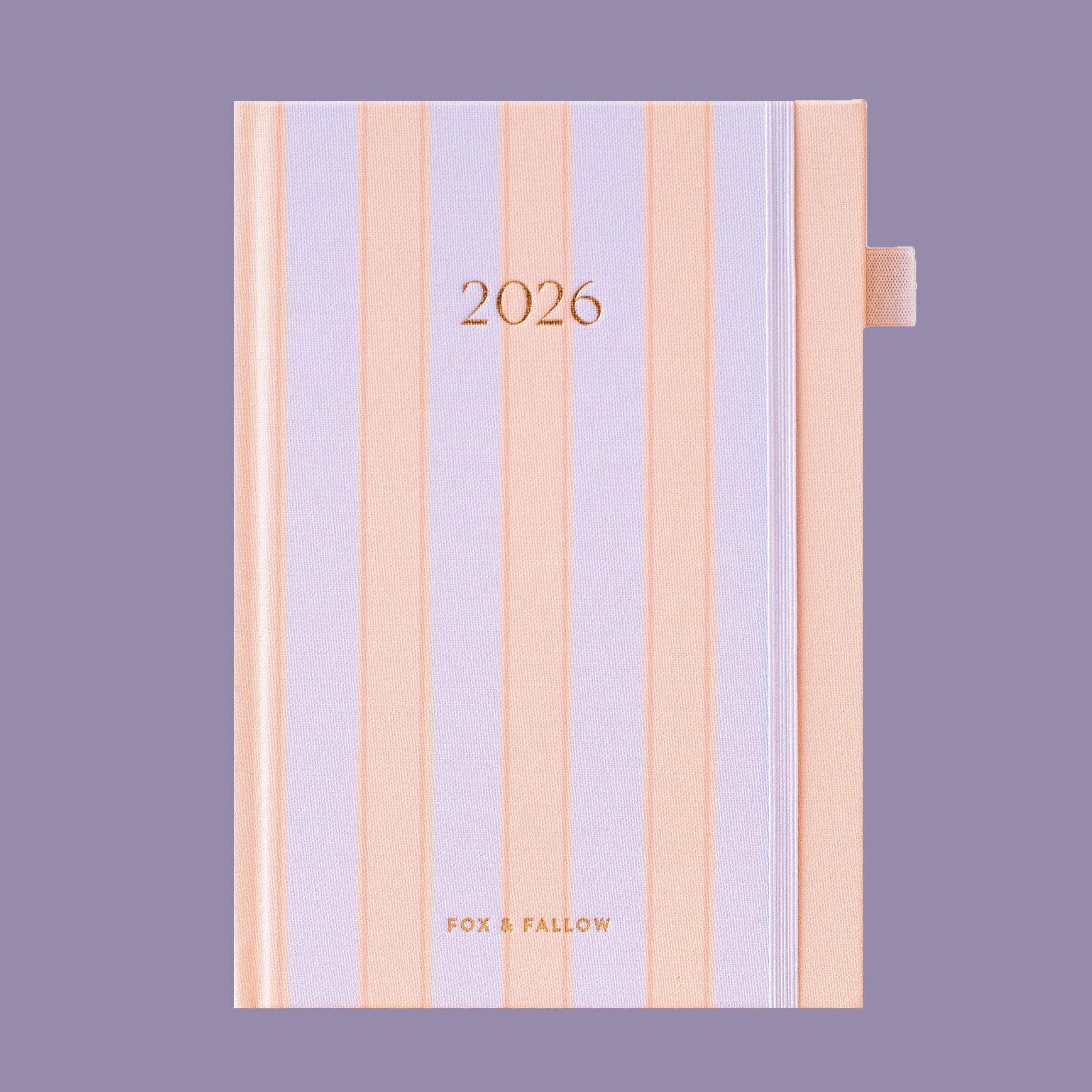 A pink and purple striped planner for 2026. 