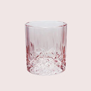 A pink drinking glass. 