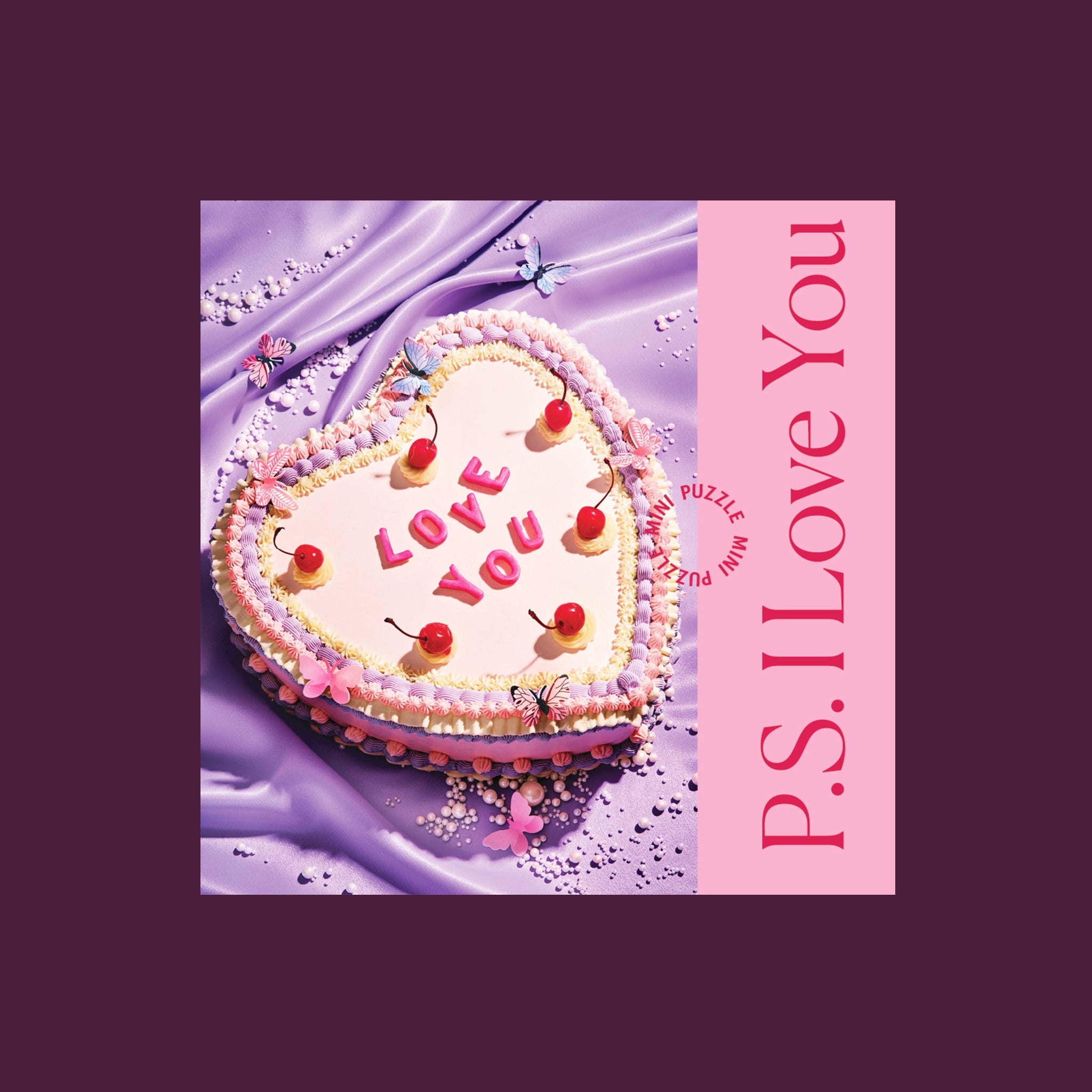 A mini puzzle box that reads, "P.S I Love You". The puzzle is of a decorated cake that reads, "Love You". 