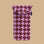 A pink and burgundy puffy glasses case.