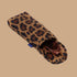 A leopard print puffy eyeglasses sleeve.