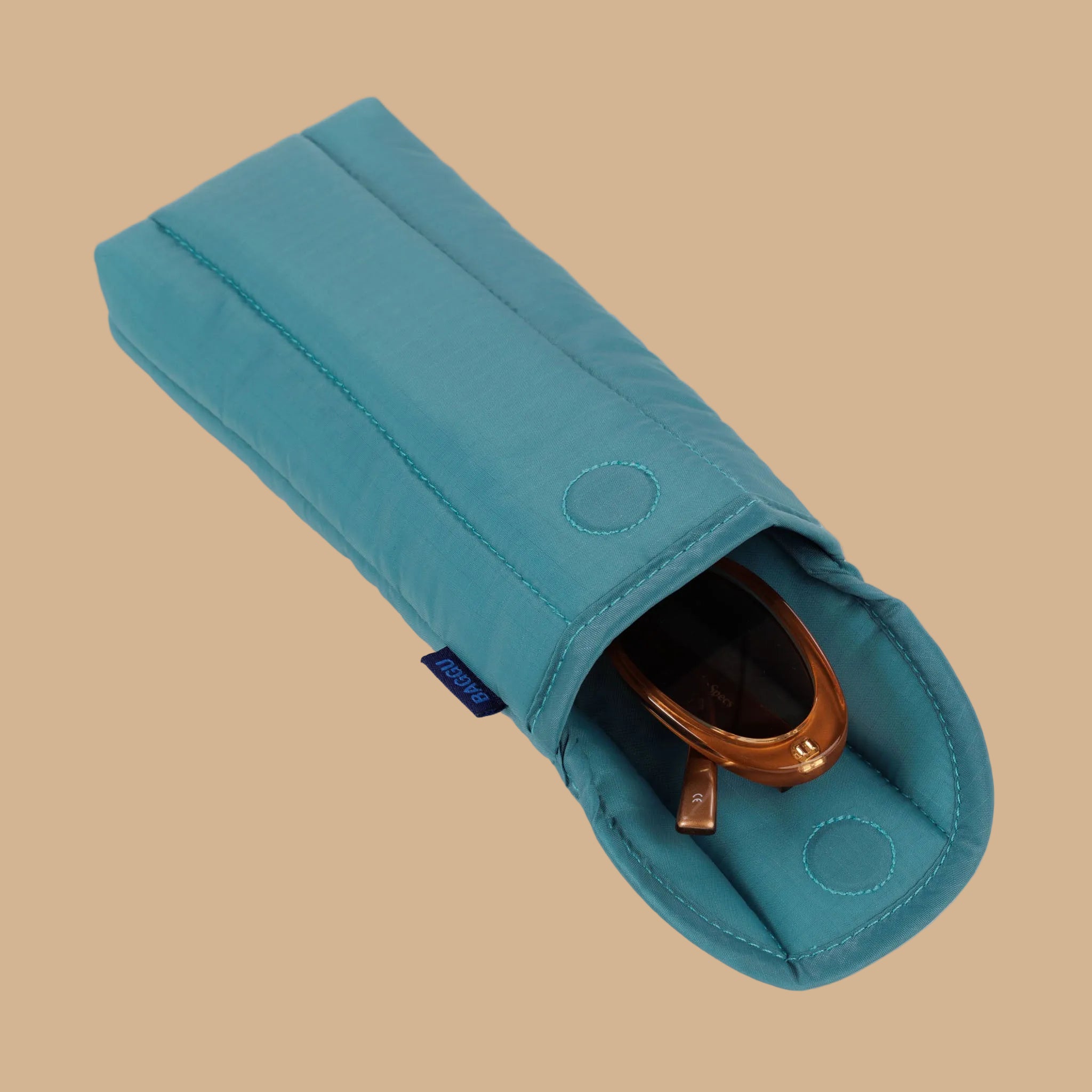 A teal puffy glasses sleeve.