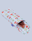 A puffy eyeglass sleeve case with a Miffy, cherry and mushroom print. 