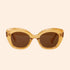 A pair of translucent yellow sunglasses with brown lenses. 