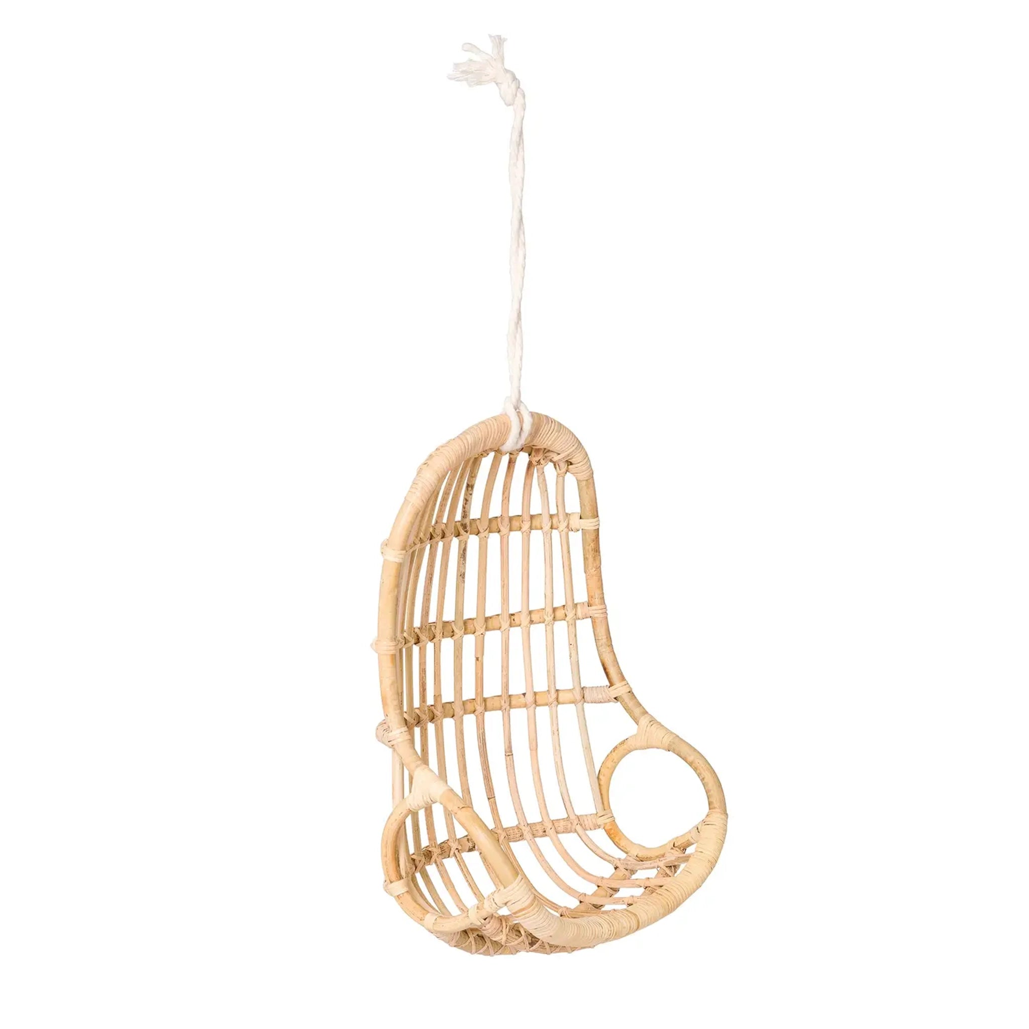 On a white background is a rattan egg shaped chair meant for baby dolls or toys. 