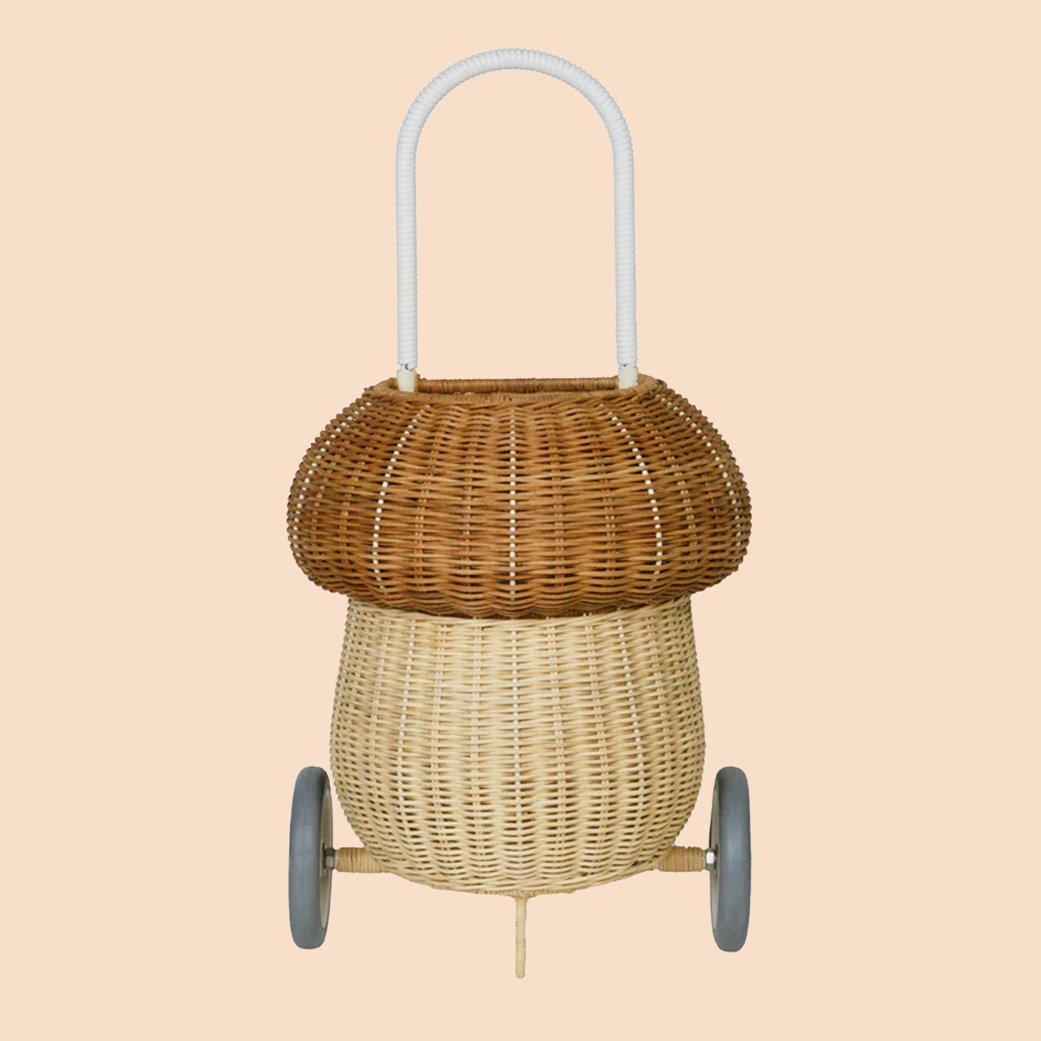 A mushroom shaped rattan basket luggy with a handle for rolling.