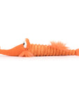 A bright orange razor fish shaped stuffed toy.