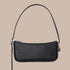 A black recycled leather small shoulder bag. 