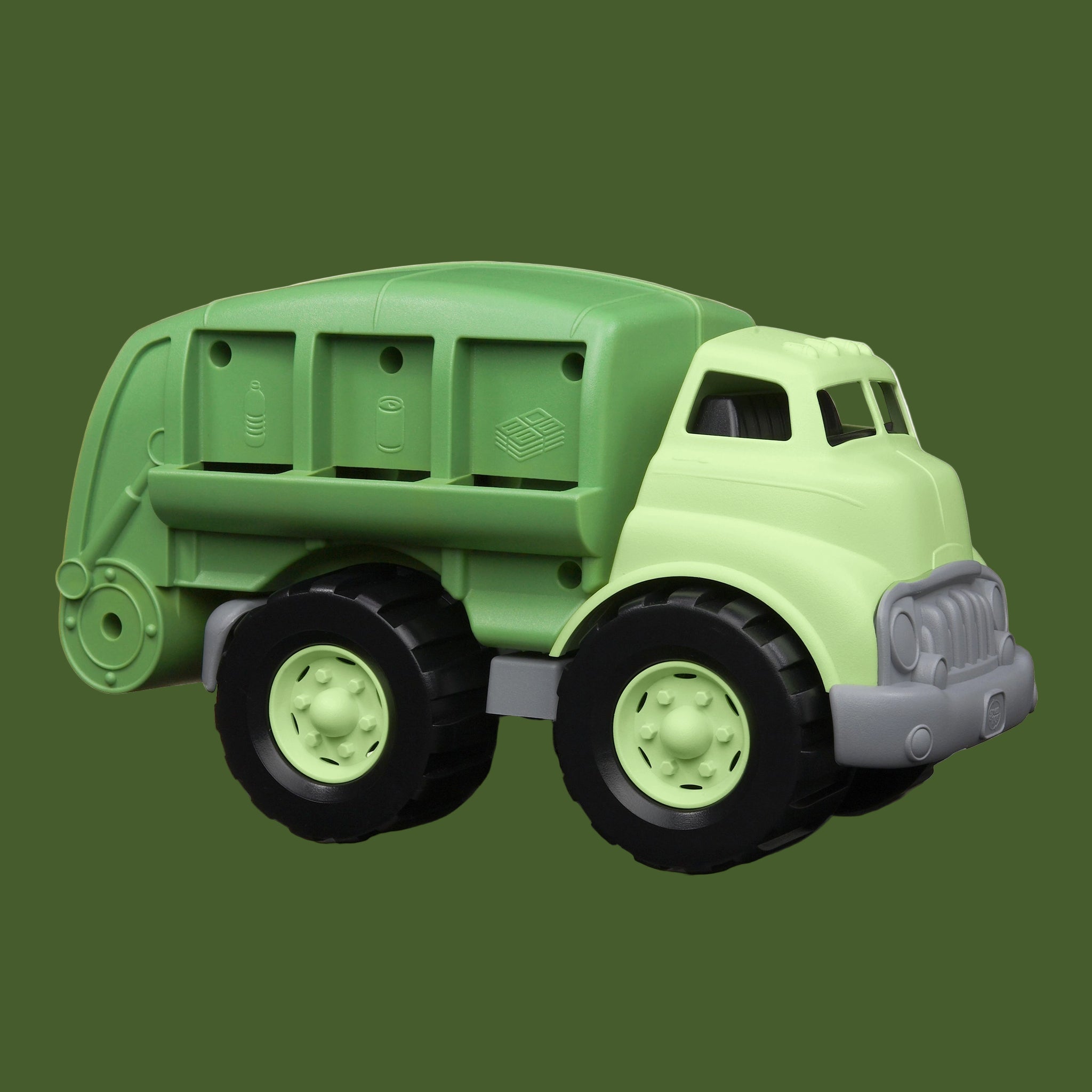 A green recycling truck shaped toy truck. 