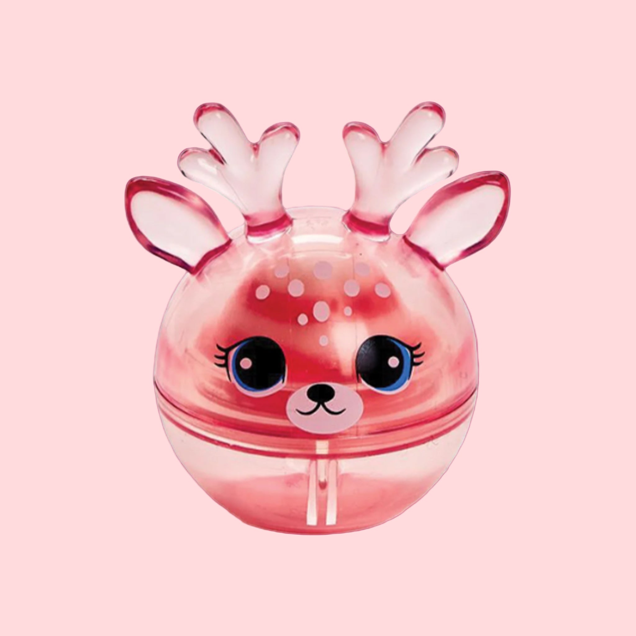 A round ball of lip balm with a reindeer face and ears and antlers. 