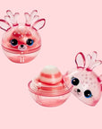 A round ball of lip balm with a reindeer face and ears and antlers. 