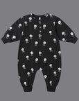 Black long sleeve jumpsuit for kids with a skull and crossbones print. 
