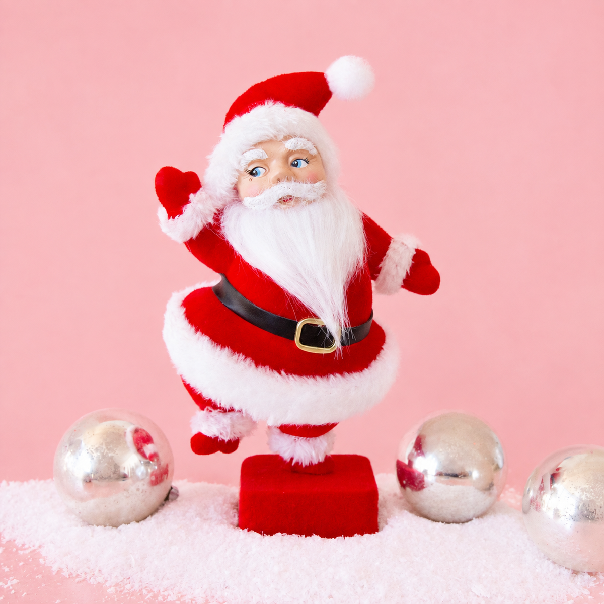 A red and white Santa figurine. 