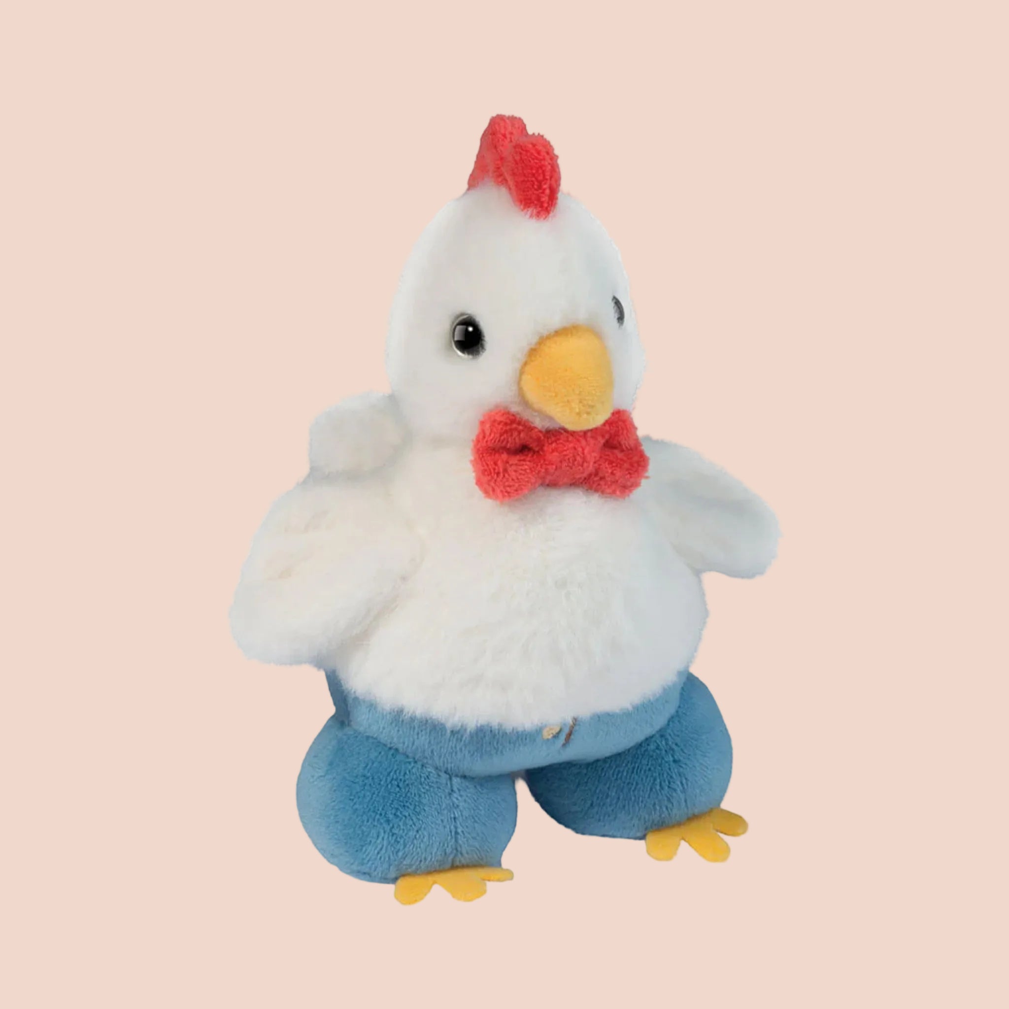 A rooster shaped stuffed animal. 