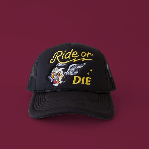 Black trucker hat that reads " Ride or Die".