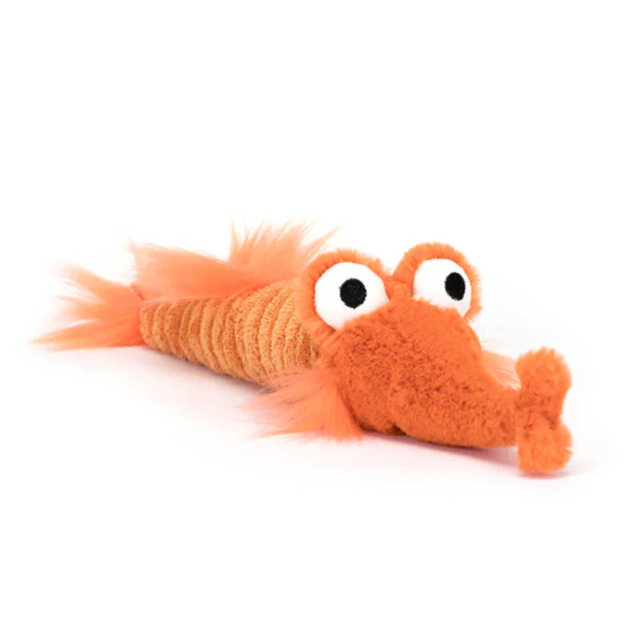 A bright orange razor fish shaped stuffed toy. 