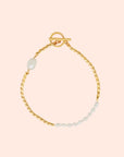 A gold and pearl bracelet. 
