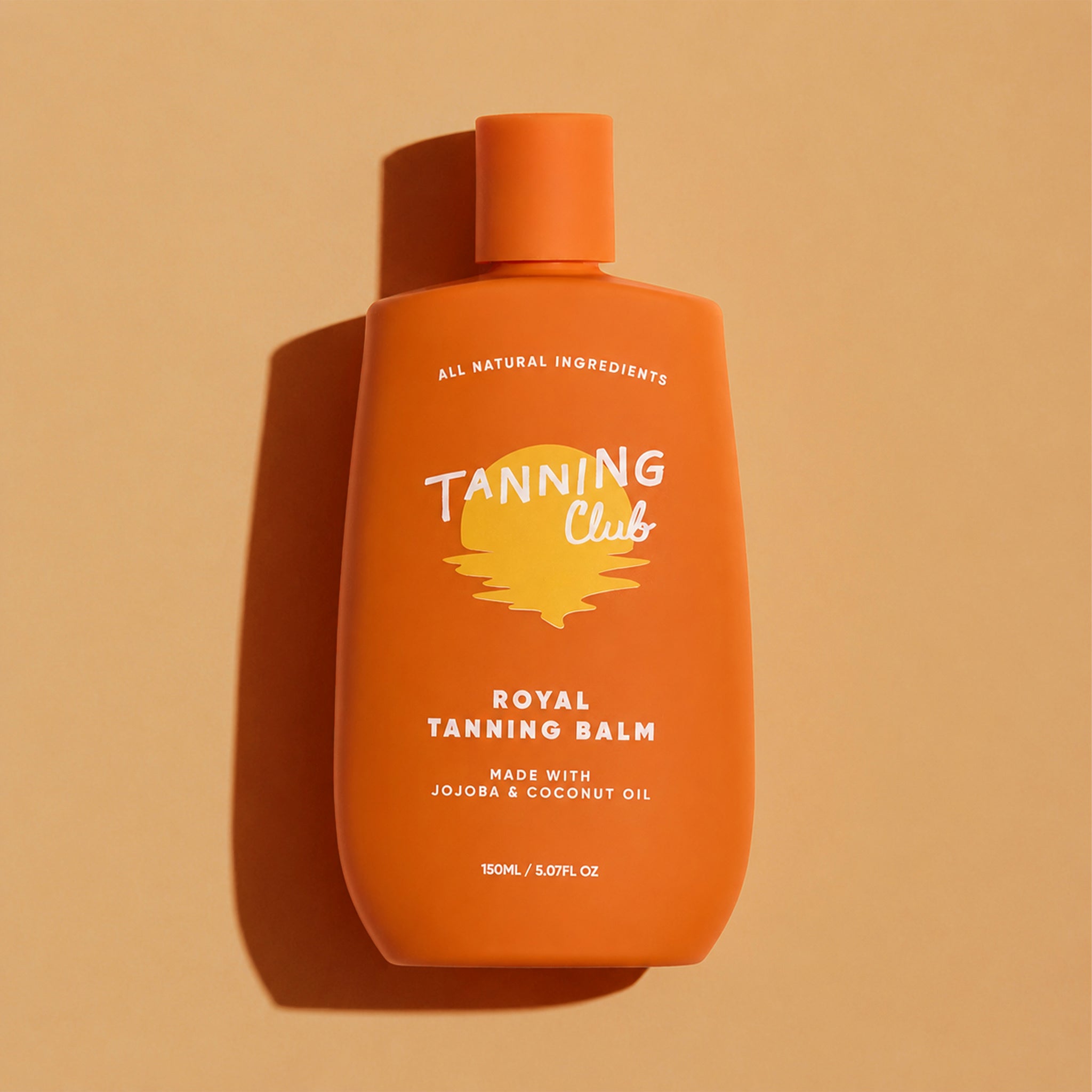 Orange bottle of Tanning Club Royal Tanning Balm on a beige background