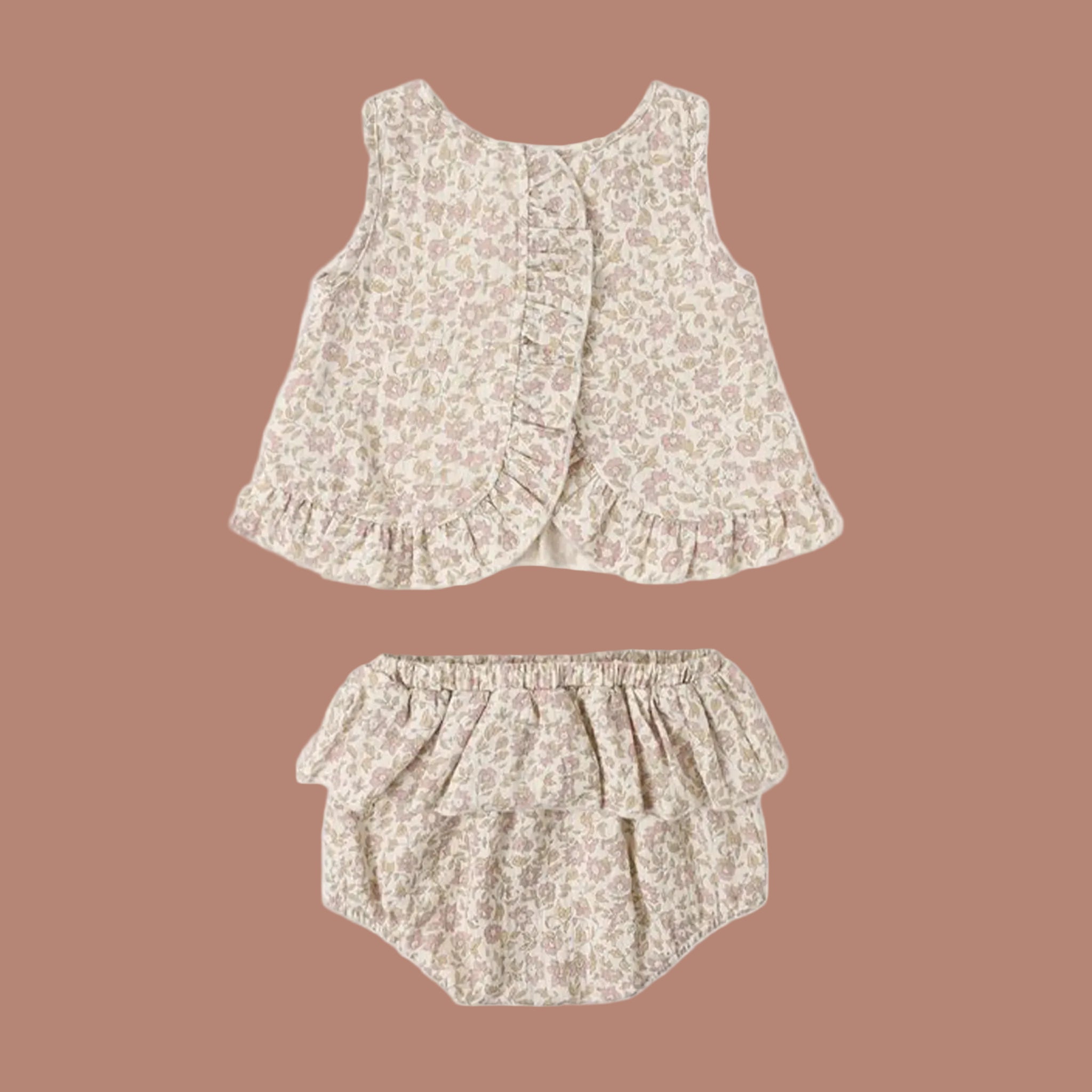 A cream and light pink tulip bloomer and top set. 
