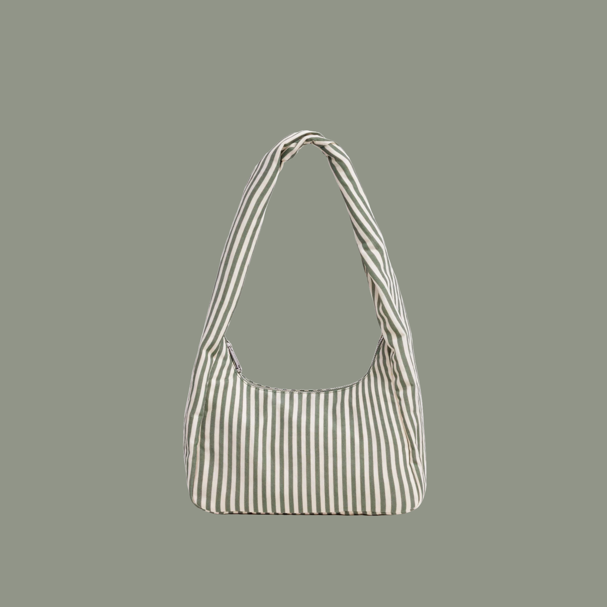 small striped bag with sage colored stripes on a sage colored background.