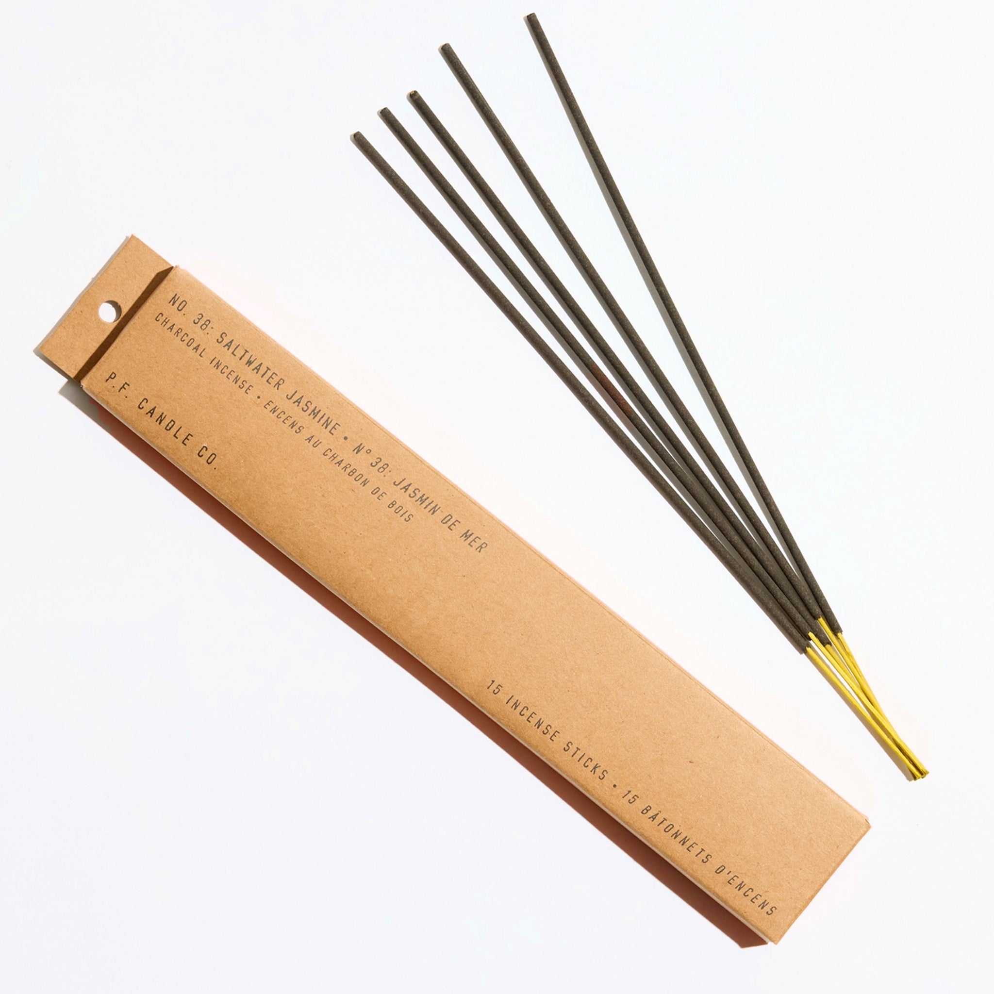 Incense sticks with a cardboard packaging on a white background