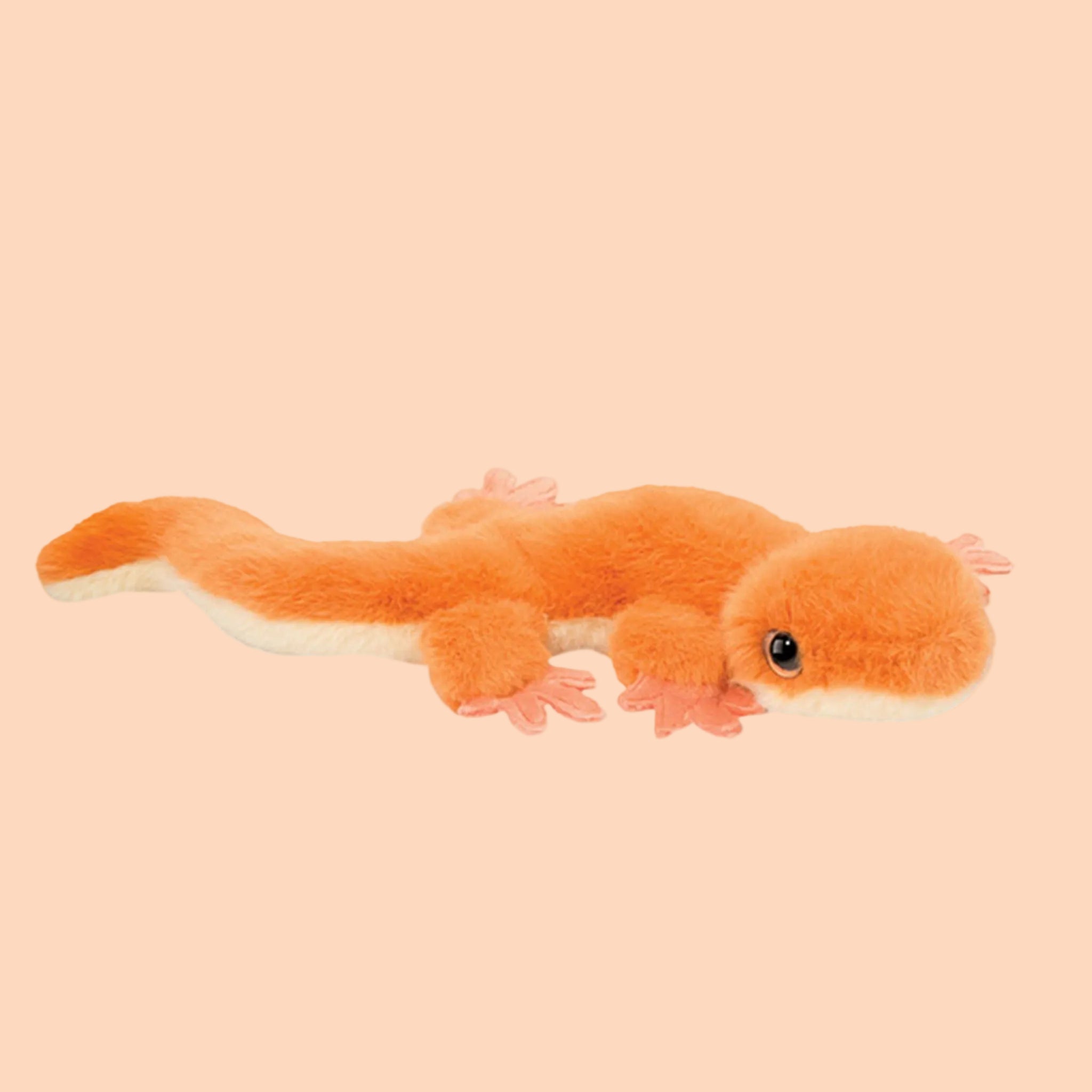 An orange salamander shaped stuffed toy. 