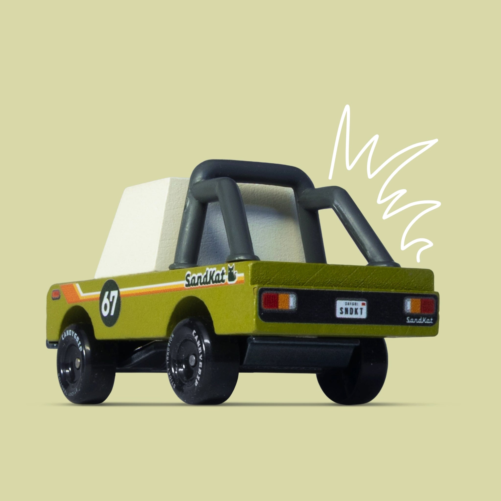 Toy sand truck with 'SandKart' branding on a beige background
